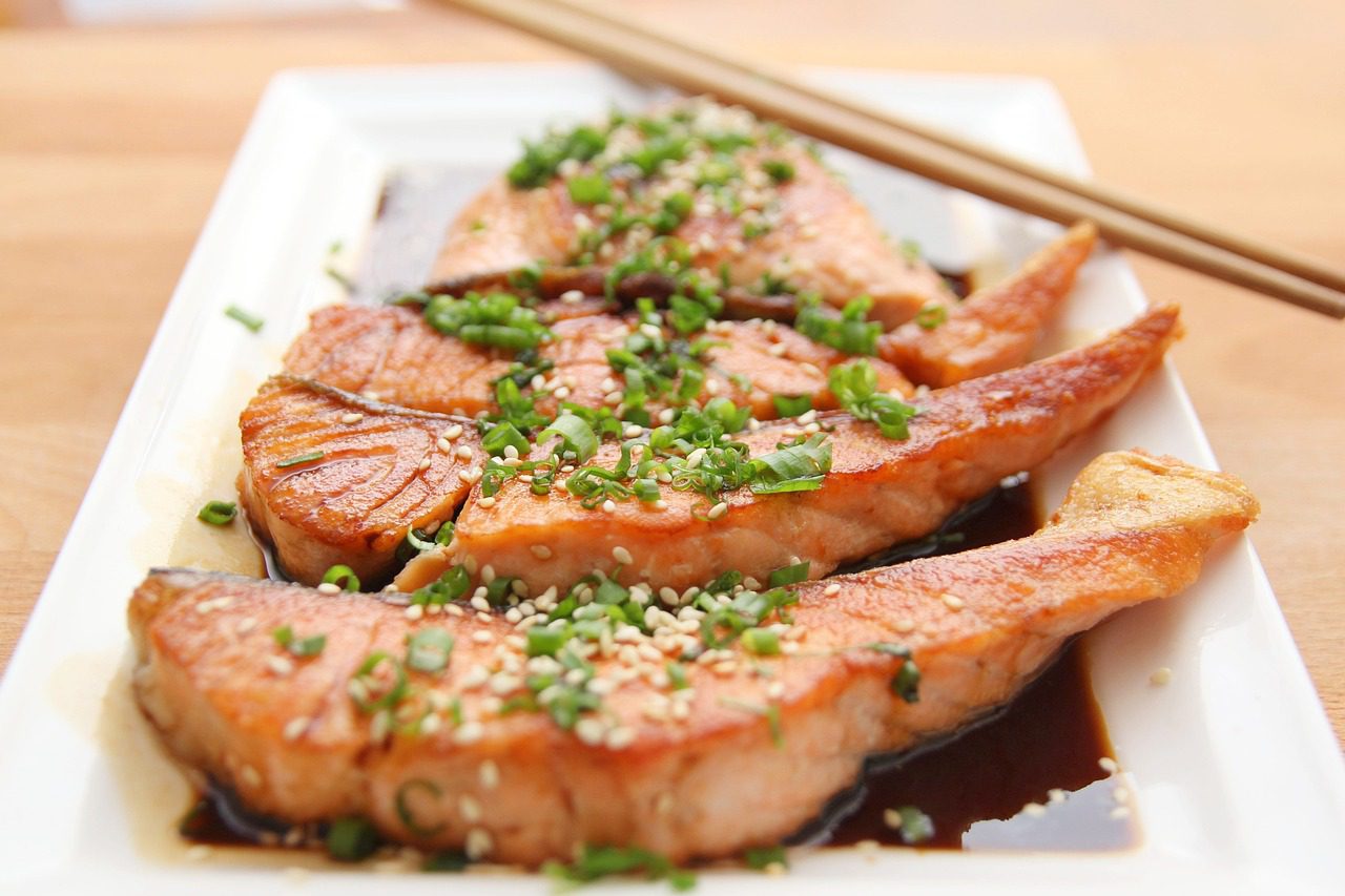 plated salmon steaks in teriyaki sauce